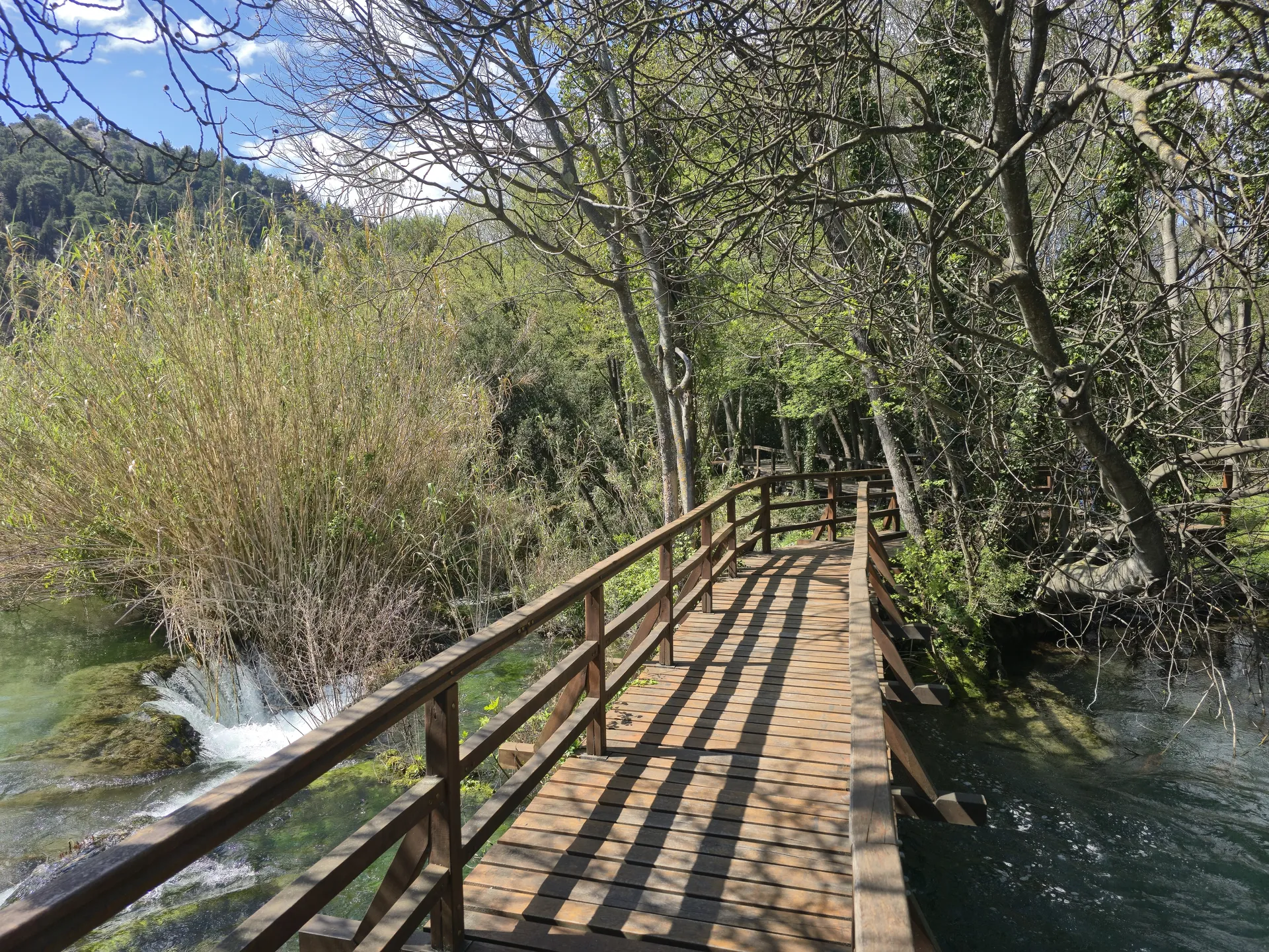 Boardwalk path over the water at Krka National Park on a day trip from Split